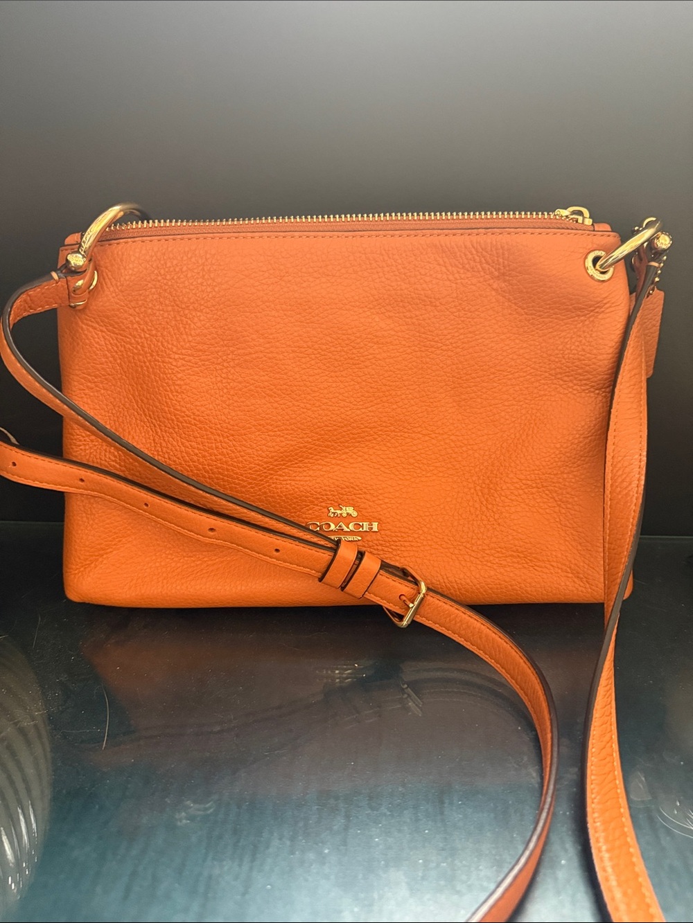 Coach Orange Pebbled Leather Crossbody with Gold Hardware